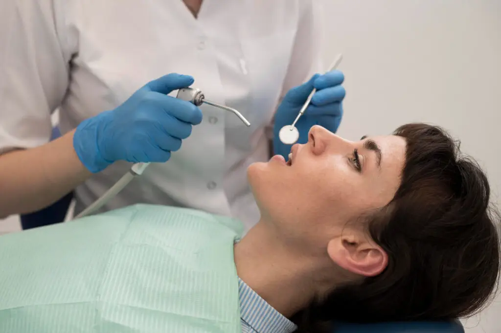 Oral sedation in Brandywine, MD patient receiving comfortable periodontal care during a dental procedure.